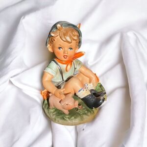 Enesco 7" Ceramic Figurine - Boy with Blue Hat Sitting with Pig
